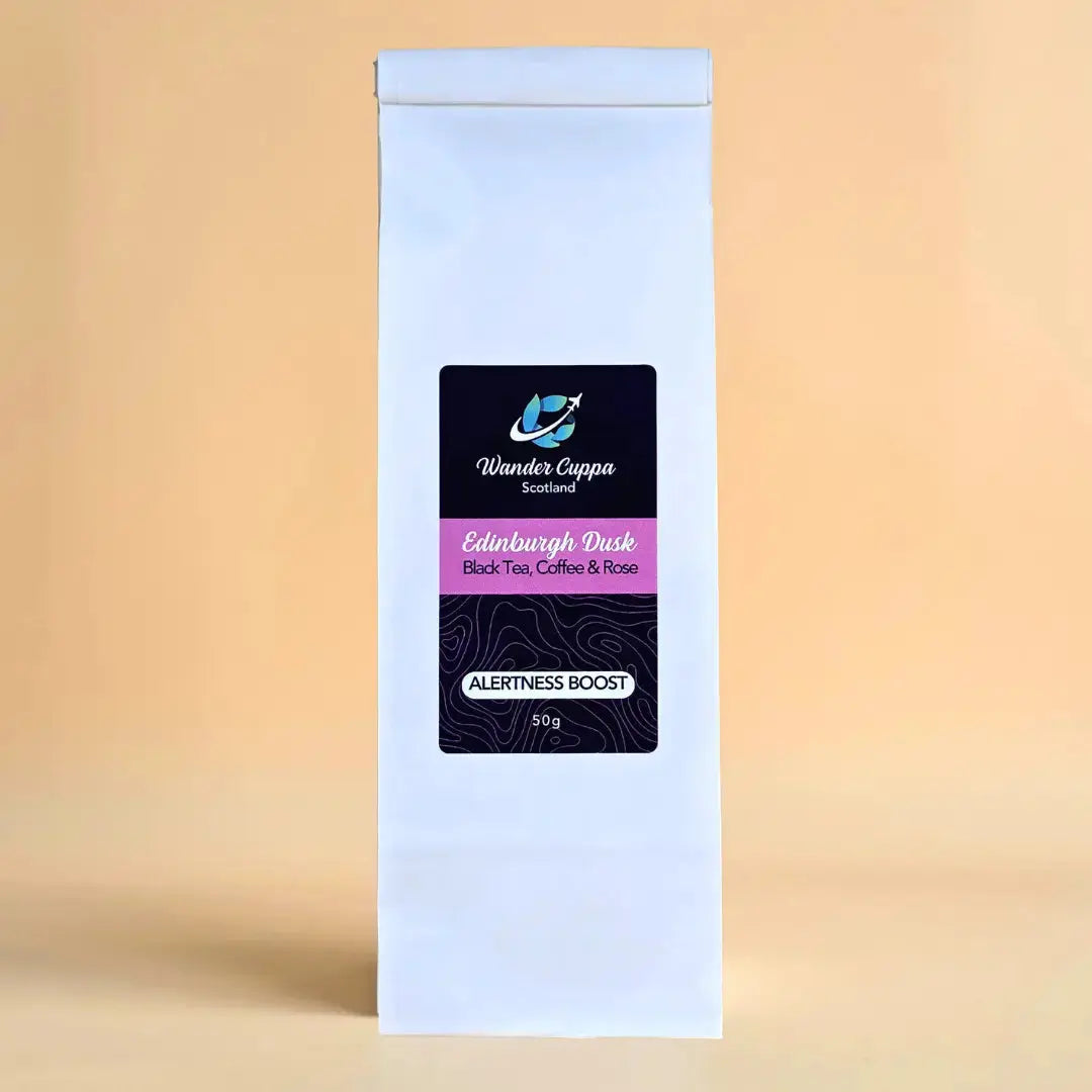 Edinburgh Dusk black loose leaf tea with roasted coffee beans and rose petals from Wander Cuppa. This premium tea is an energising Scottish blend inspired by the capital, perfect for a relaxing cuppa tea or afternoon tea. As a wholesale tea supplier UK, we provide this vegan tea and full leaf tea for cafes and retail across Scotland and the UK. A unique blend of loose leaf tea near me featuring bold black tea leaves, cocoa, and coffee beans.