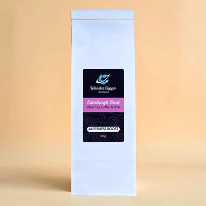 Edinburgh Dusk black loose leaf tea with roasted coffee beans and rose petals from Wander Cuppa. This premium tea is an energising Scottish blend inspired by the capital, perfect for a relaxing cuppa tea or afternoon tea. As a wholesale tea supplier UK, we provide this vegan tea and full leaf tea for cafes and retail across Scotland and the UK. A unique blend of loose leaf tea near me featuring bold black tea leaves, cocoa, and coffee beans.
