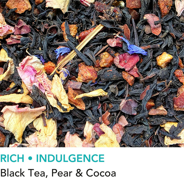 Glasgow Sunset black loose leaf tea from Wander Cuppa featuring rich cocoa beans and pear pieces. This premium tea is a decadent Scottish blend with rose petals and cornflower blossoms, ideal for a cosy afternoon tea or evening treat. As a wholesale tea supplier UK, we provide this vegan tea and full leaf tea for retail and cafes throughout Scotland and the UK. Authentic loose leaf tea near me with indulgent chocolate and fruit notes