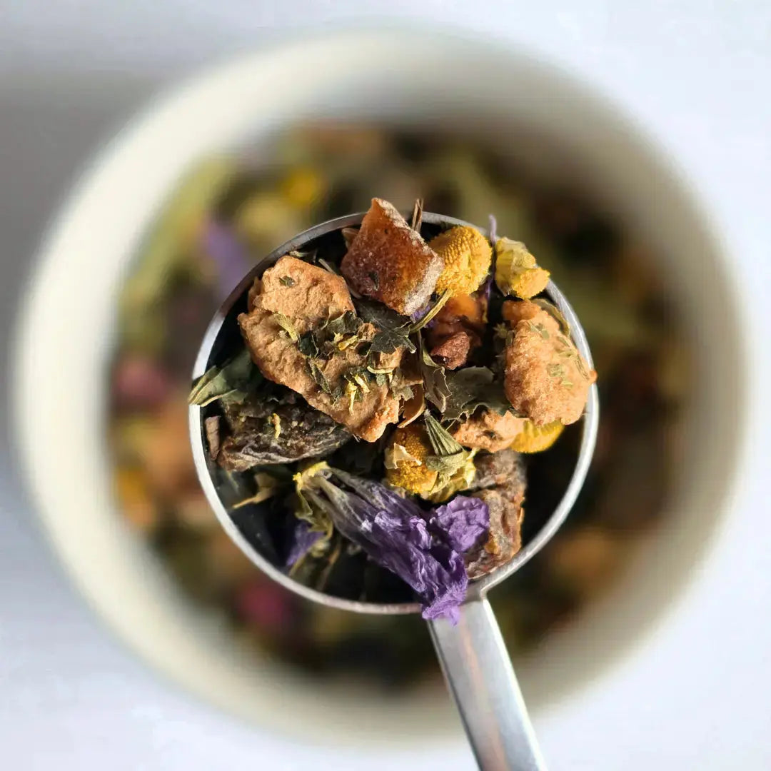 Heather Meadow herbal loose leaf tea from Wander Cuppa featuring chamomile spearmint and apple pieces. This premium tea is a caffeine free herbal infusion inspired by wild Scottish landscapes, perfect for a soothing cuppa tea or afternoon tea. As a wholesale tea supplier UK, we provide this vegan tea and full leaf tea for cafes and shops across Scotland and the UK. High-quality loose leaf tea near me with lemon verbena and delicate floral notes for a calming cup of tea.