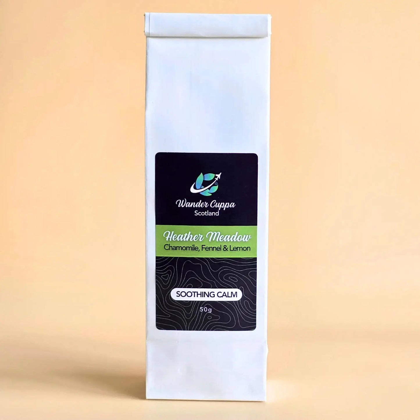 Heather Meadow herbal loose leaf tea from Wander Cuppa featuring chamomile spearmint and apple pieces. This premium tea is a caffeine free herbal infusion inspired by wild Scottish landscapes, perfect for a soothing cuppa tea or afternoon tea. As a wholesale tea supplier UK, we provide this vegan tea and full leaf tea for cafes and shops across Scotland and the UK. High-quality loose leaf tea near me with lemon verbena and delicate floral notes for a calming cup of tea.