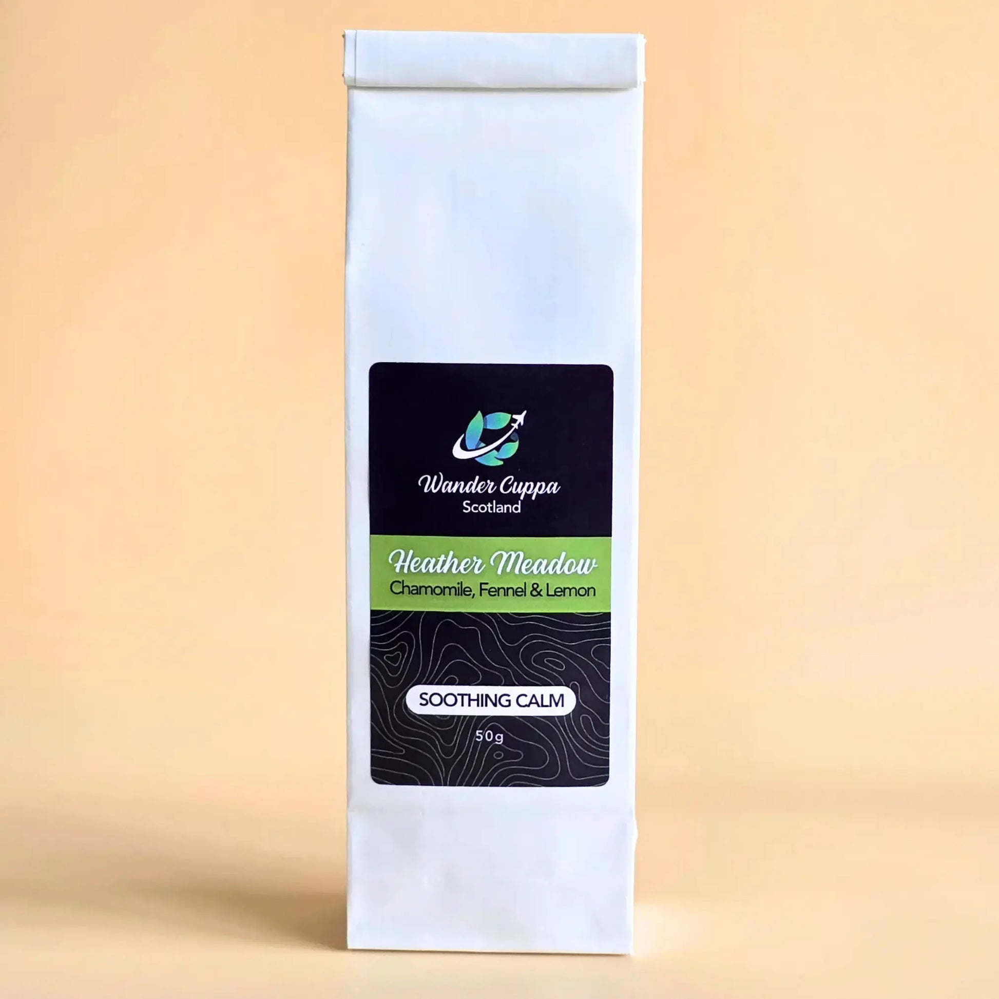 Heather Meadow herbal loose leaf tea from Wander Cuppa featuring chamomile spearmint and apple pieces. This premium tea is a caffeine free herbal infusion inspired by wild Scottish landscapes, perfect for a soothing cuppa tea or afternoon tea. As a wholesale tea supplier UK, we provide this vegan tea and full leaf tea for cafes and shops across Scotland and the UK. High-quality loose leaf tea near me with lemon verbena and delicate floral notes for a calming cup of tea.