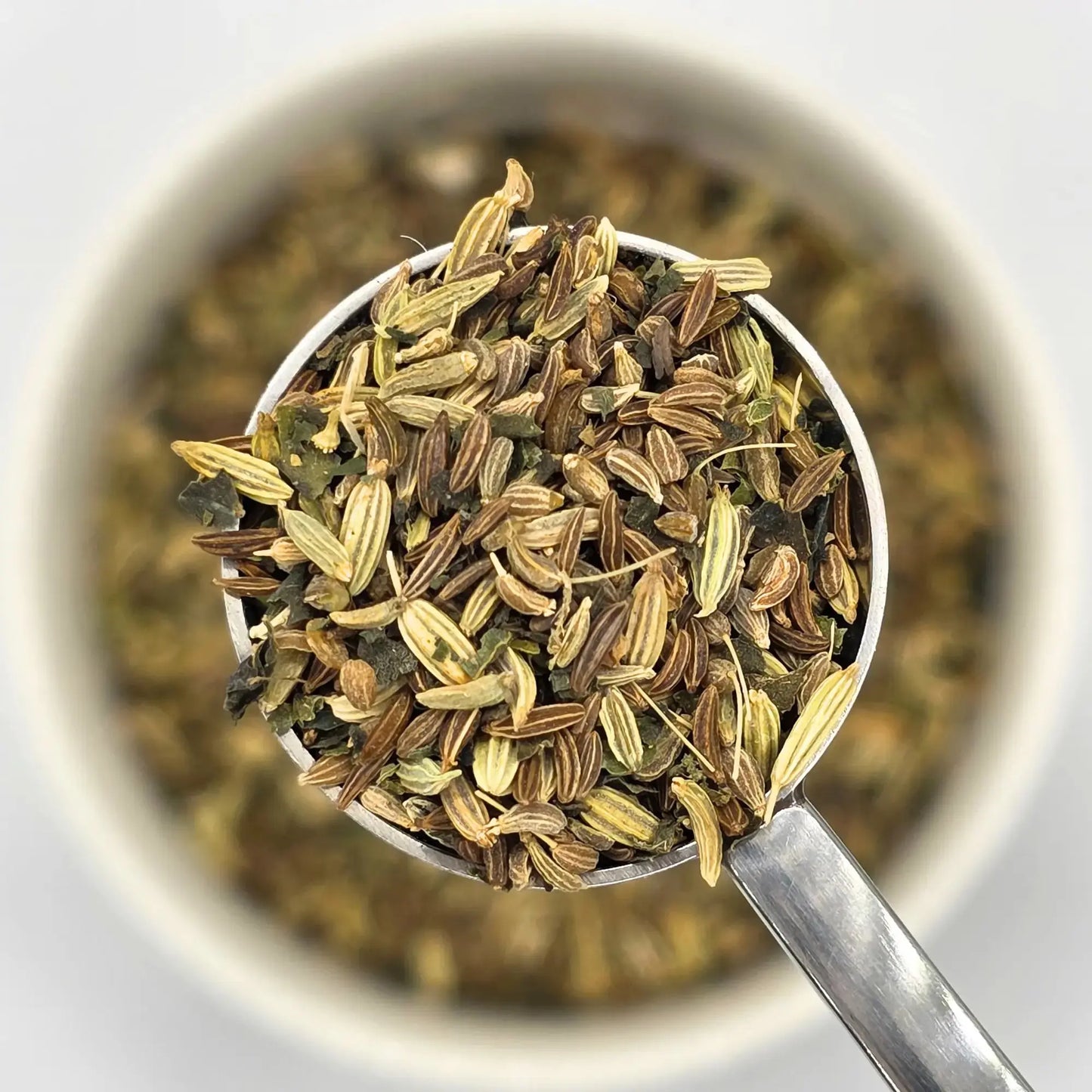 Highland Breeze herbal loose leaf tea from Wander Cuppa featuring a caffeine free blend of caraway, aniseeds, fennel seeds, and nettle leaves. This premium tea is a soothing Scottish herbal infusion inspired by the Highlands, perfect for digestion and a relaxing cuppa tea. As a wholesale tea supplier UK, we offer this vegan tea and full leaf tea for cafes and retail across Scotland and the UK. High-quality caffeine free tea and loose leaf tea near me for a restorative cup of tea.
