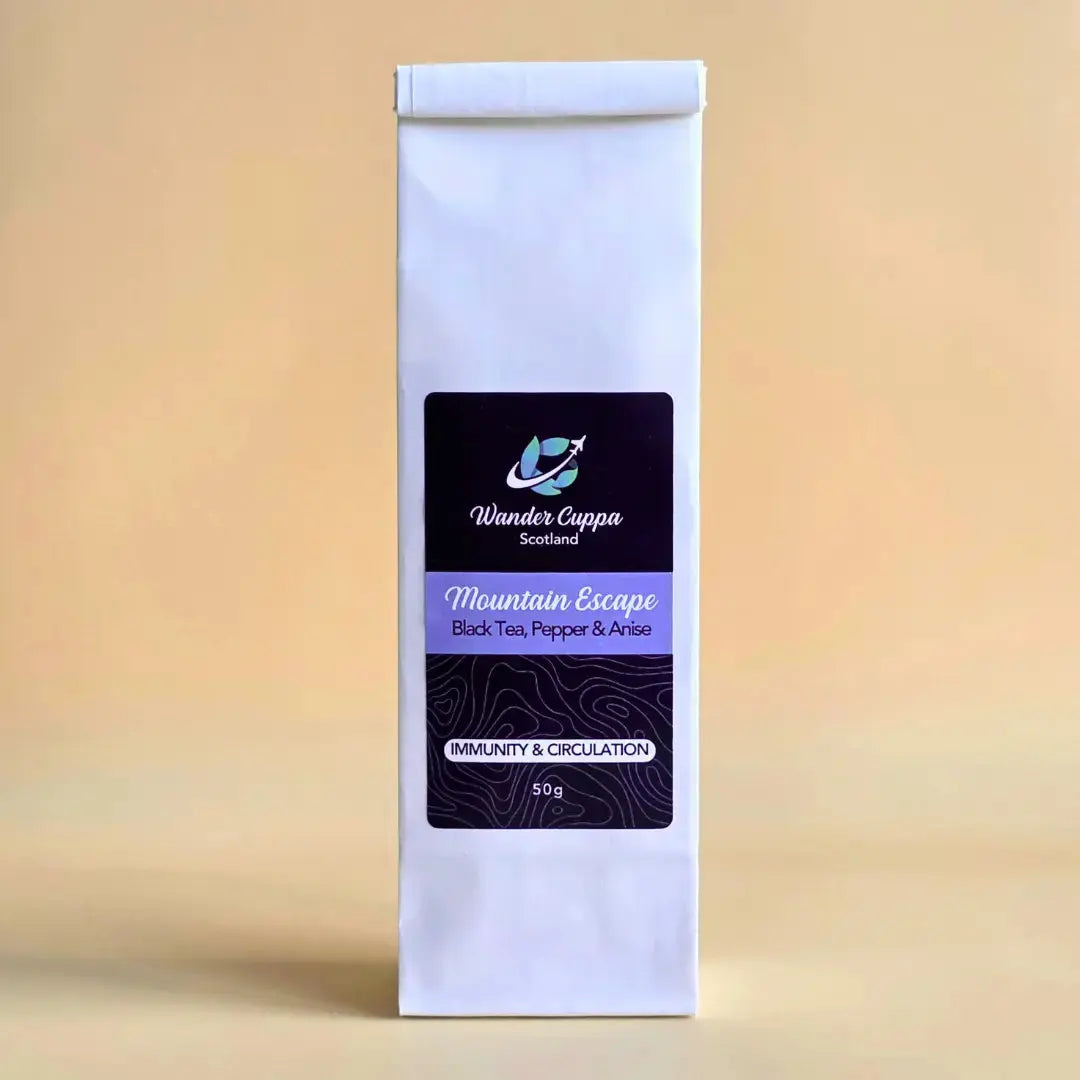 Mountain Escape chai loose leaf tea from Wander Cuppa featuring a bold blend of black tea, cassia bark, and star anise. This premium tea is inspired by rugged Scottish mountains and provides a warming boost for your immune system. As a wholesale tea supplier UK, we offer this spiced vegan tea and full leaf tea for a perfect cuppa tea or afternoon tea. High-quality Scotland tea with black pepper and cocoa beans available for wholesale tea orders across the UK.