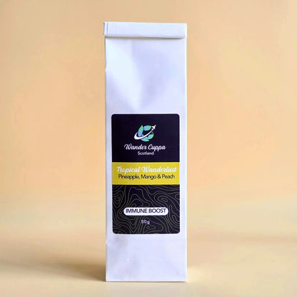 Tropical Wanderlust fruit infusion loose leaf tea from Wander Cuppa. This caffeine free tea is a premium tea blend featuring candied pineapple, papaya, and mango pieces for a refreshing tropical flavour. As a wholesale tea supplier UK, we provide this vegan tea and full leaf tea for cafes and retail across Scotland and the UK. High-quality loose leaf tea near me and tea Scotland favourite perfect for a vibrant cuppa tea or afternoon tea. A healthy fruit tea that supports the immune system and offers a taste